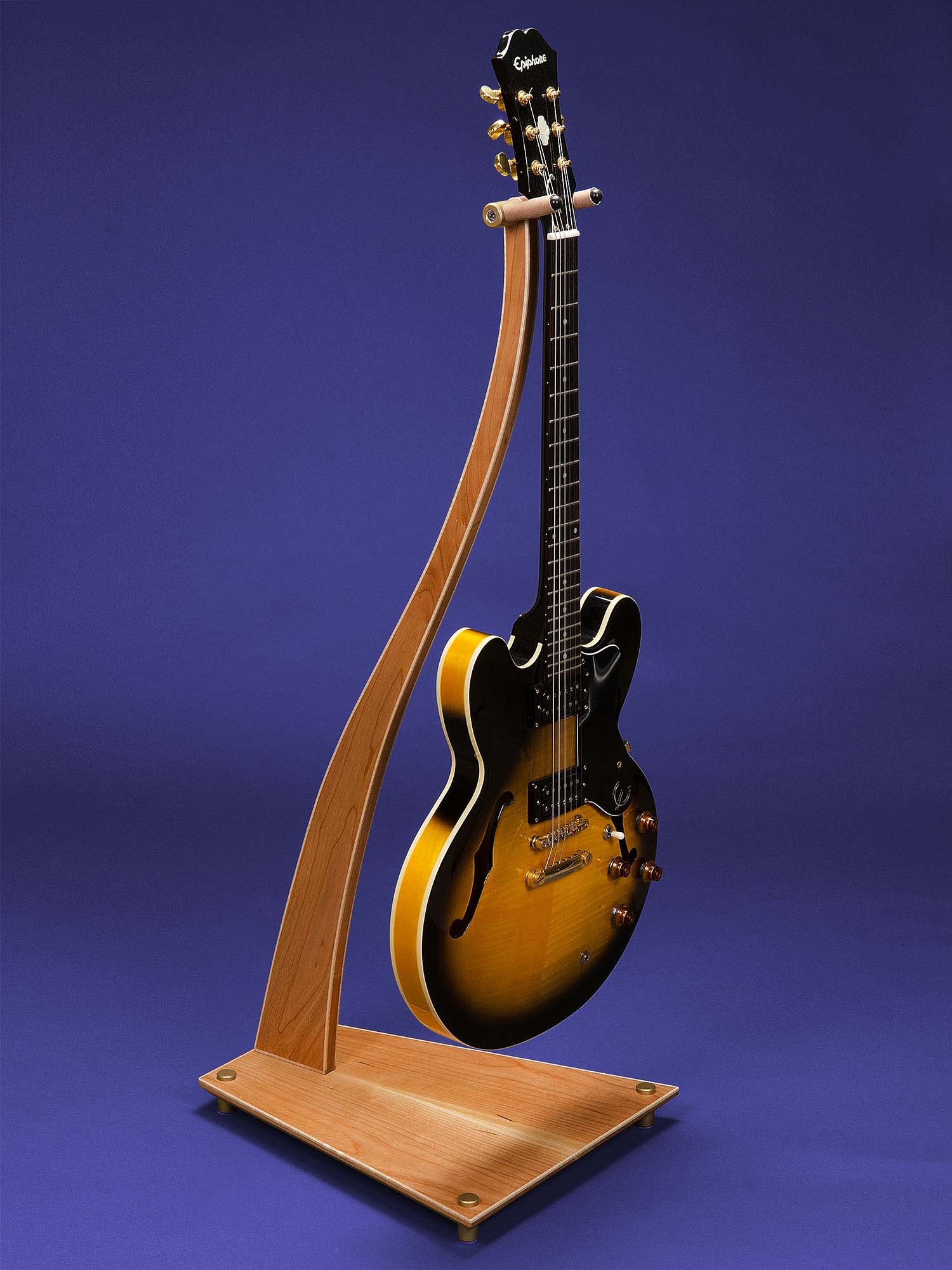 SM Guitar Stand in Cherry with Curly Maple Binding.