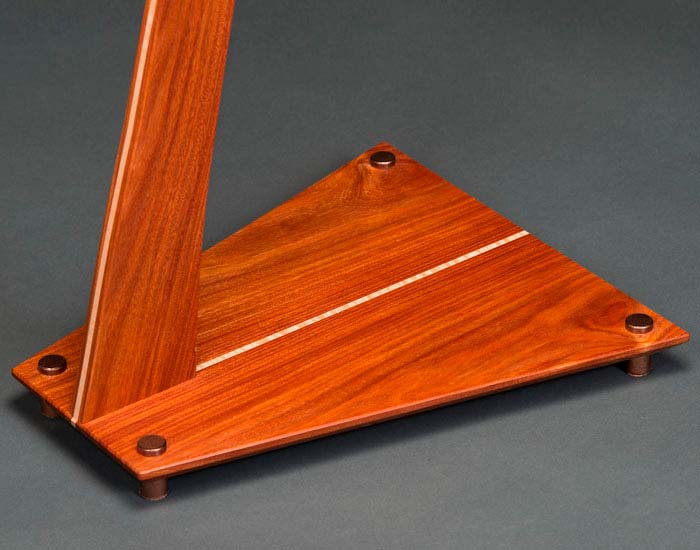 Santos mahogany SM guitar stand with curly maple inlay and copper powdercoated aluminum feet.